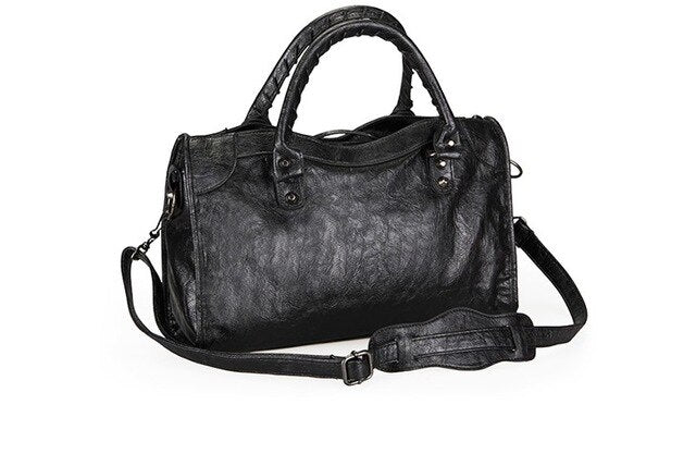 free shipping Fashion lady handbag tassel locomotive one shoulder aslant bag tassels girls handbag tote rivet